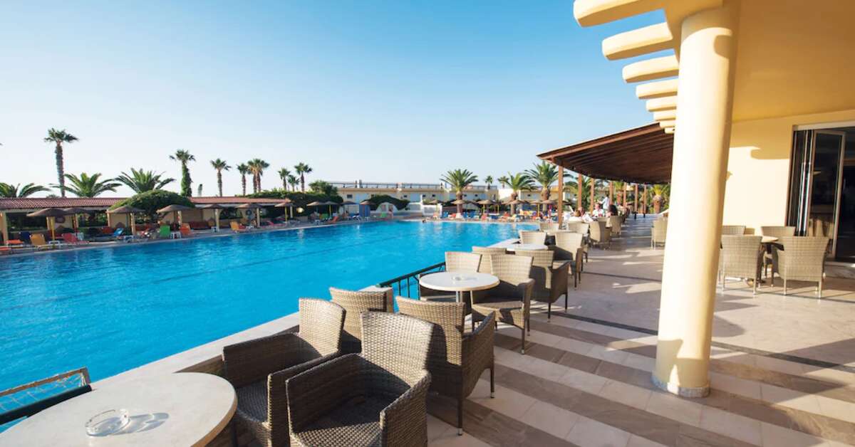 Een foto van het terras bij Euro Village Achilleas Hotel