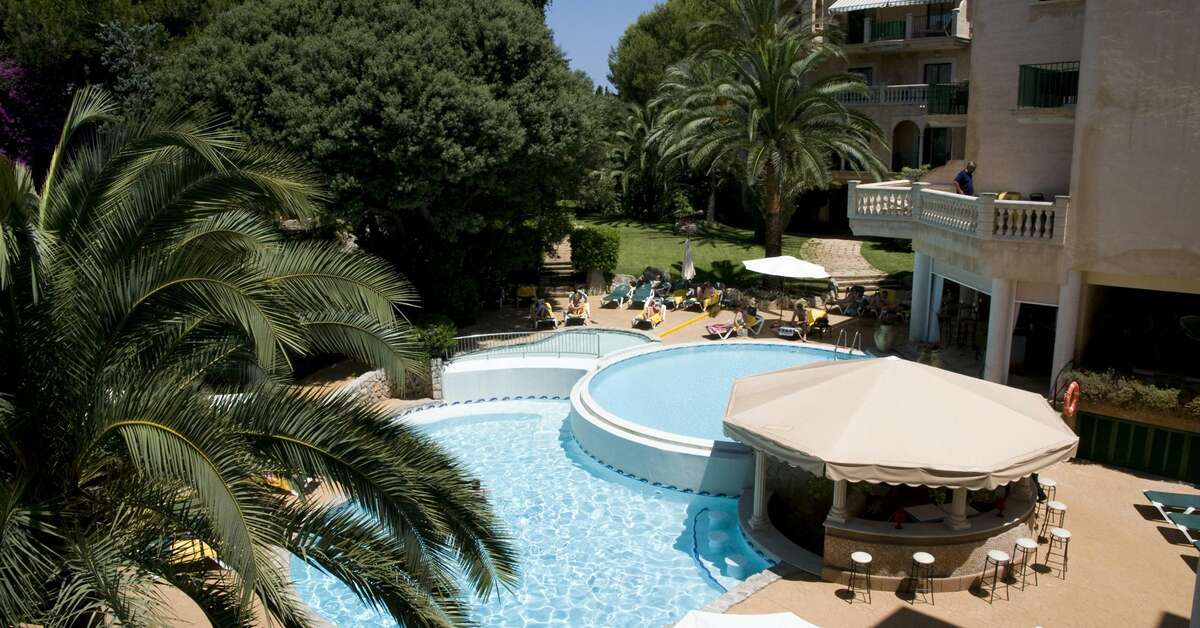Een foto van het zwembad bij Hotel Lago Garden Suites & Spa