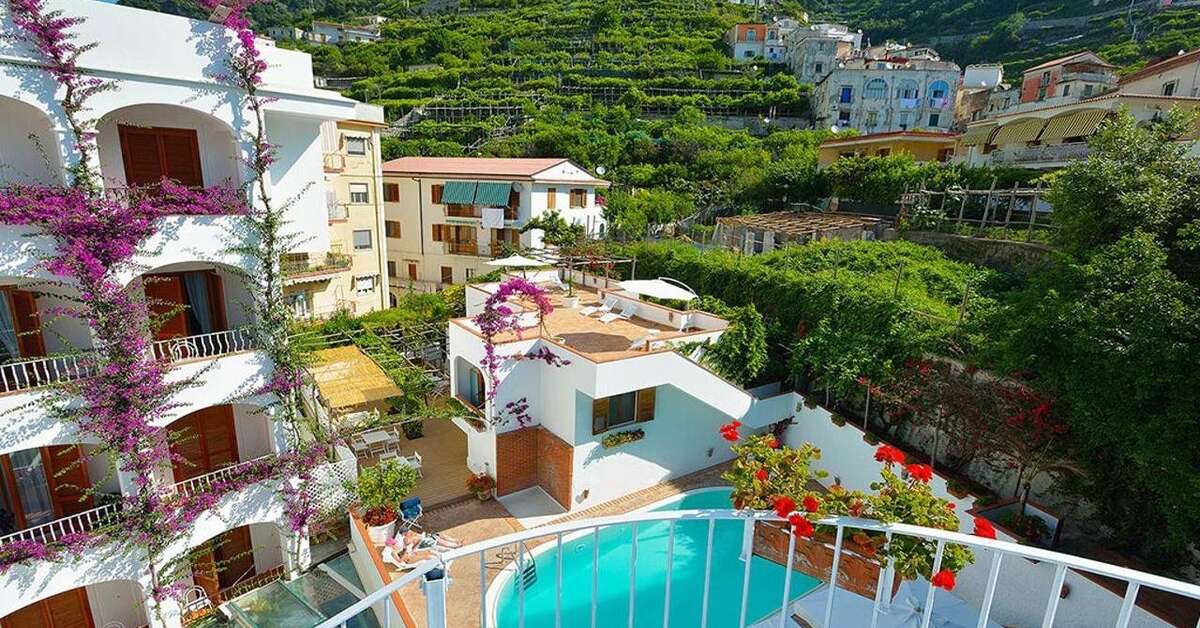 Een foto van het zwembad bij Hotel Villa Romana