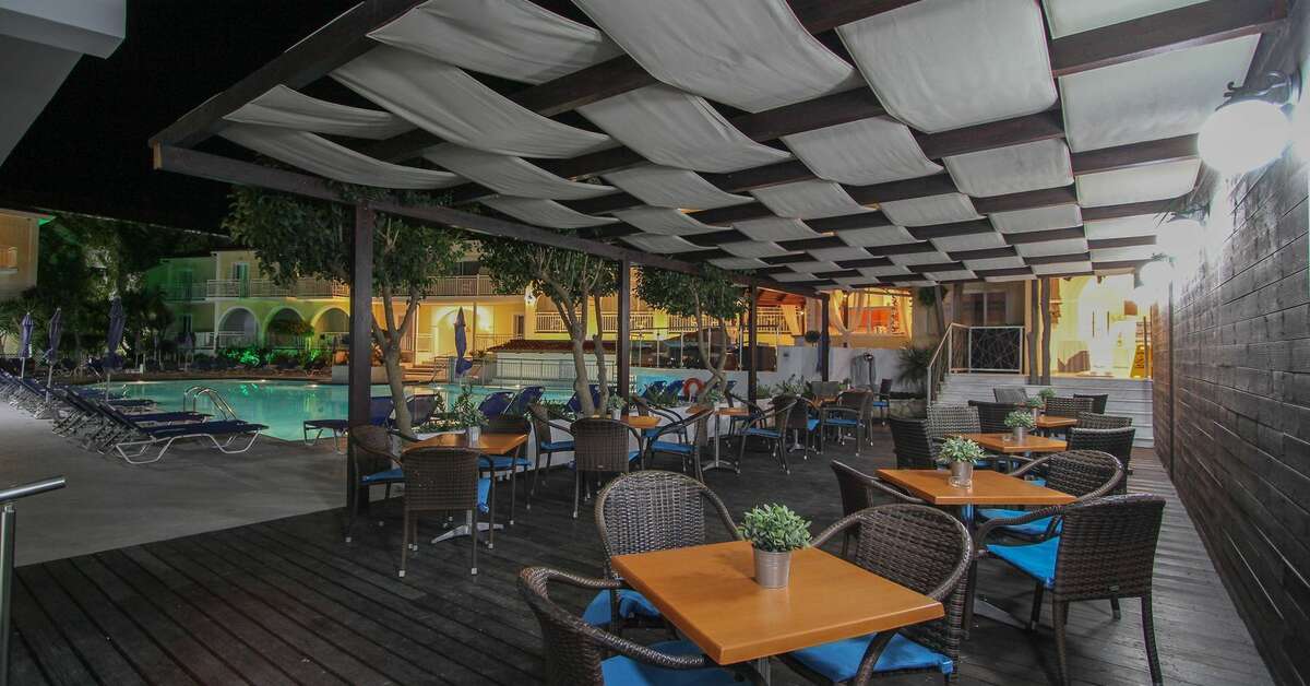 Een foto van het terras bij Diana Palace Hotel