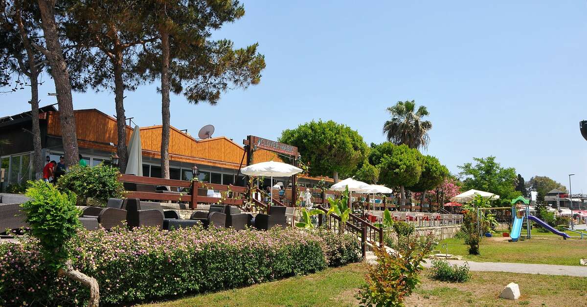 Een foto van het terras bij Clover Magic Nova Beach Hotel