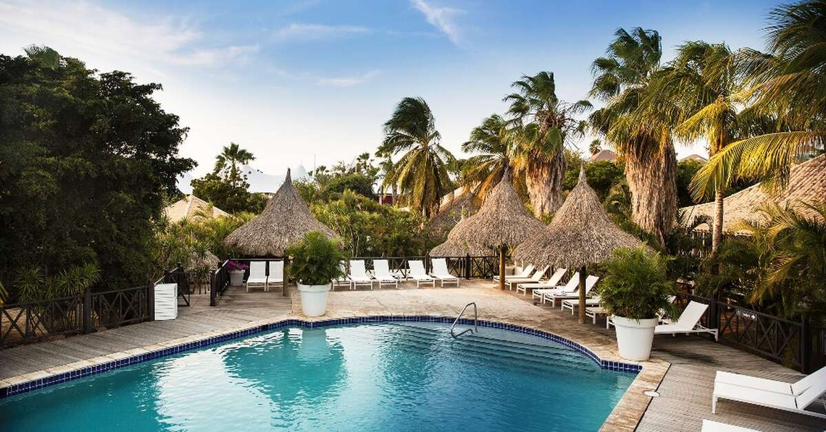 Een foto van het zwembad bij Papagayo Beach Resort