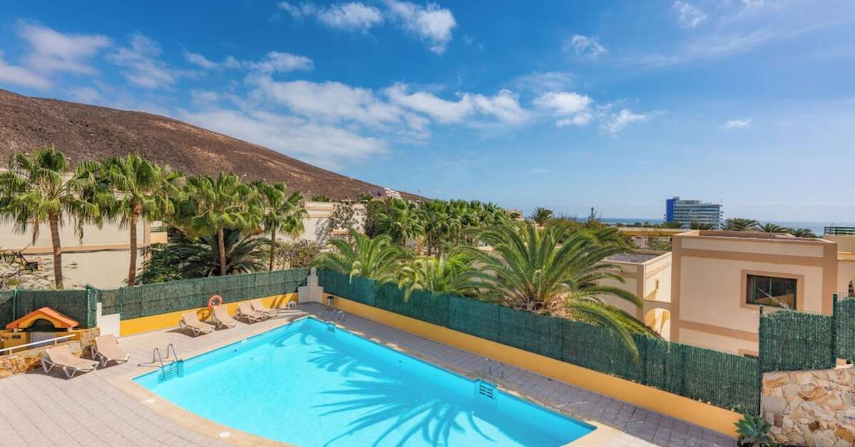 Een foto van het zwembad bij Appartementen Livvo Punta Marina
