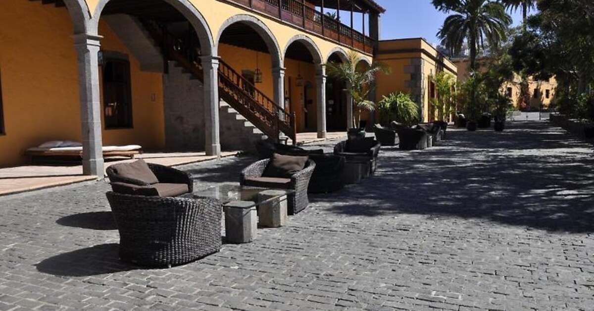 Een foto van het terras bij La Hacienda del Buen Suceso