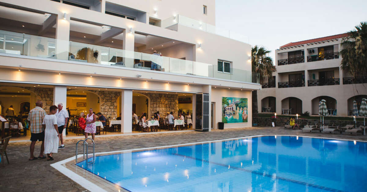 Een foto van het zwembad bij Hotel Mimosa Beach