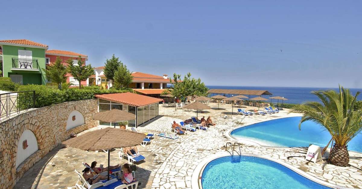 Een foto van het zwembad bij Porto Skala Hotel