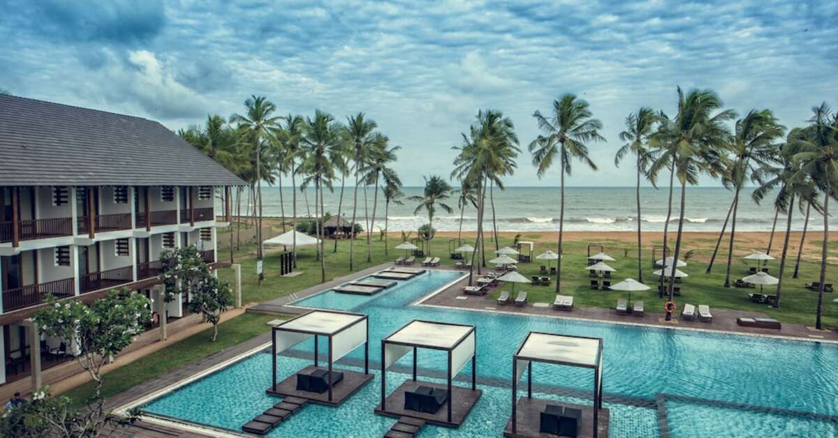 Een foto van het zwembad bij Suriya Luxury Resort
