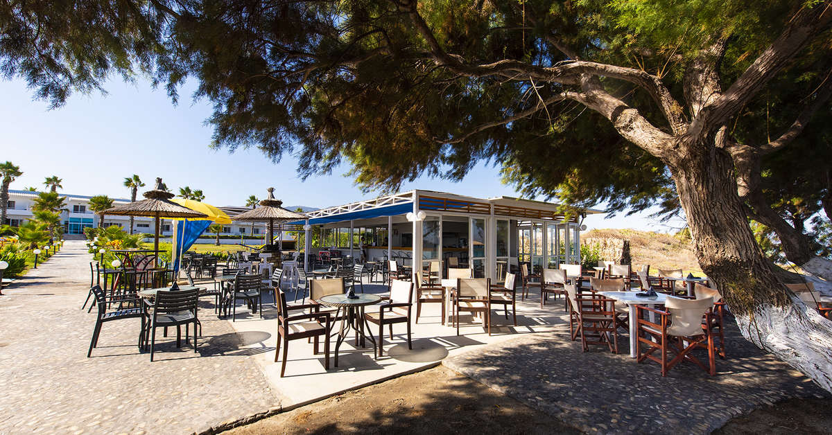 Een foto van het terras bij Costa Angela Seaside Resort
