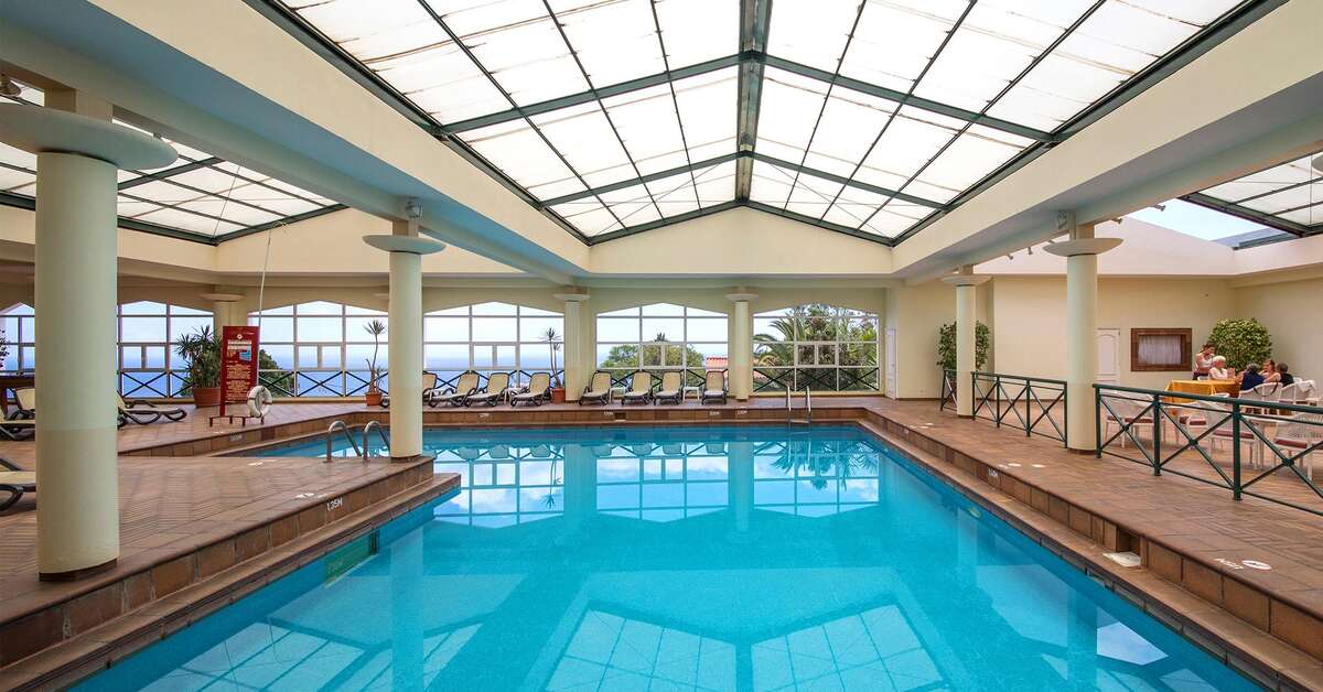Een foto van het zwembad bij Garajau Madeira Hotel Ocean & Nature Appartementen