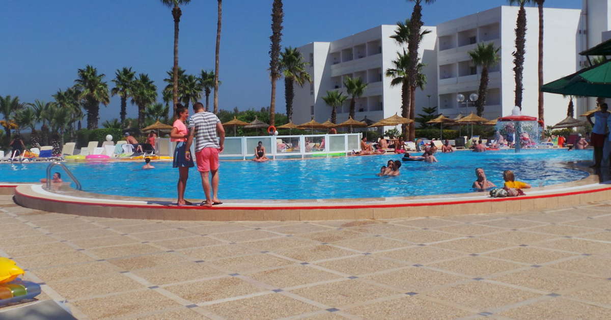 Een foto van het zwembad bij Hotel Club Tropicana & Spa