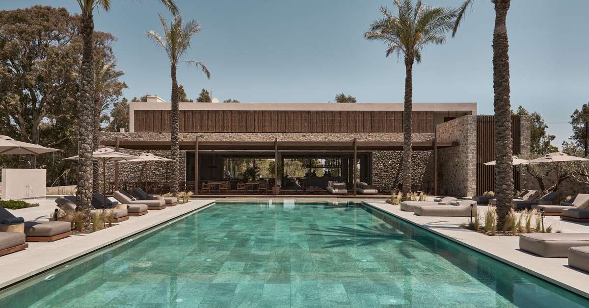Een foto van het zwembad bij Theros All Suite Hotel