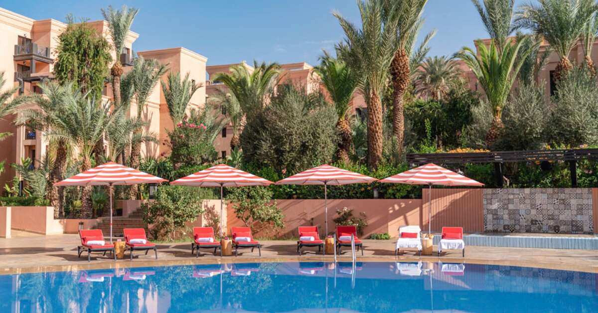 Een foto van het zwembad bij Mövenpick Hotel Mansour Eddahbi Marrakech