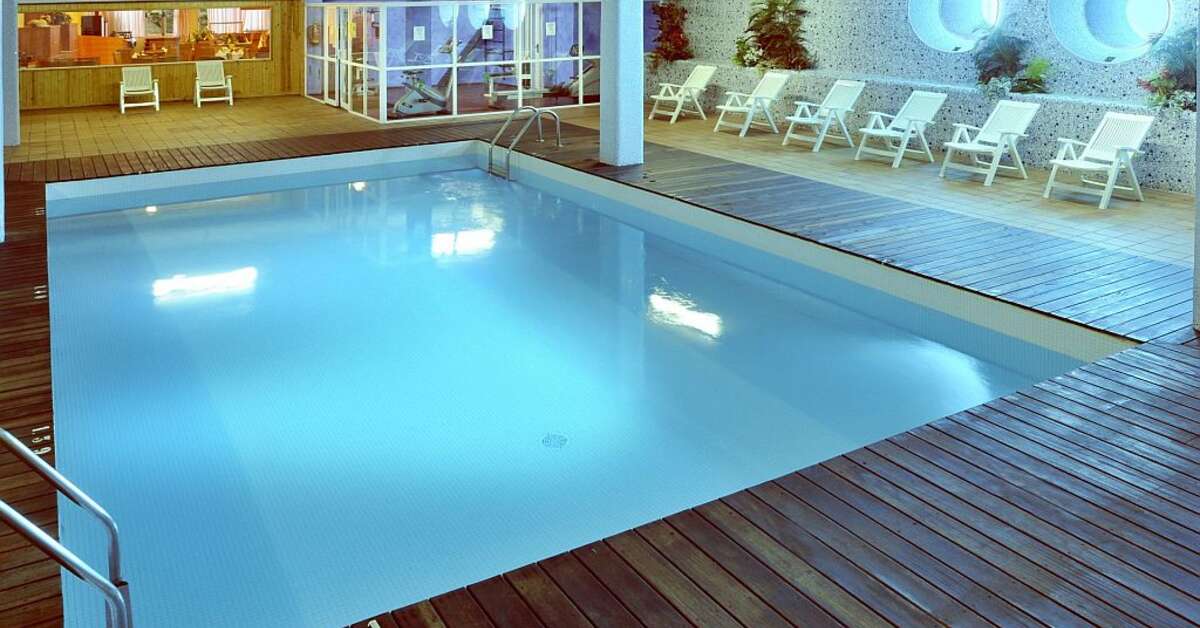 Een foto van het zwembad bij Hotel GHT Oasis Tossa