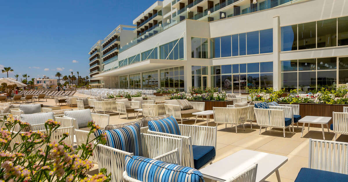 Een foto van het terras bij Chrysomare Beach Hotel & Resort