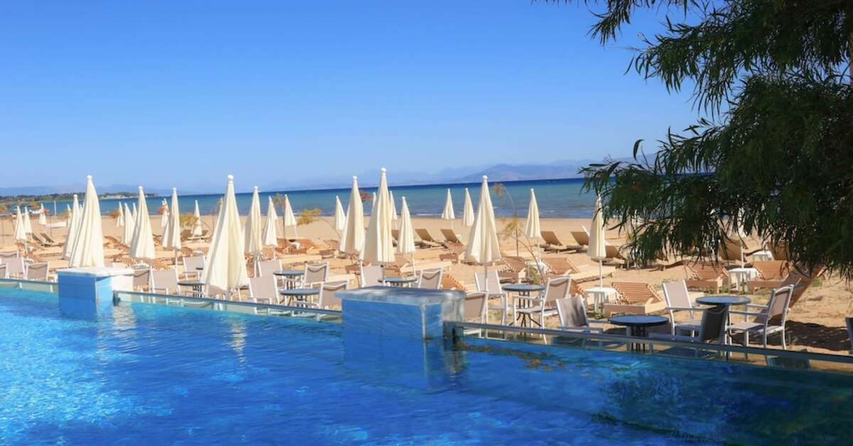 Een foto van het zwembad bij Cavomarina Beach Hotel