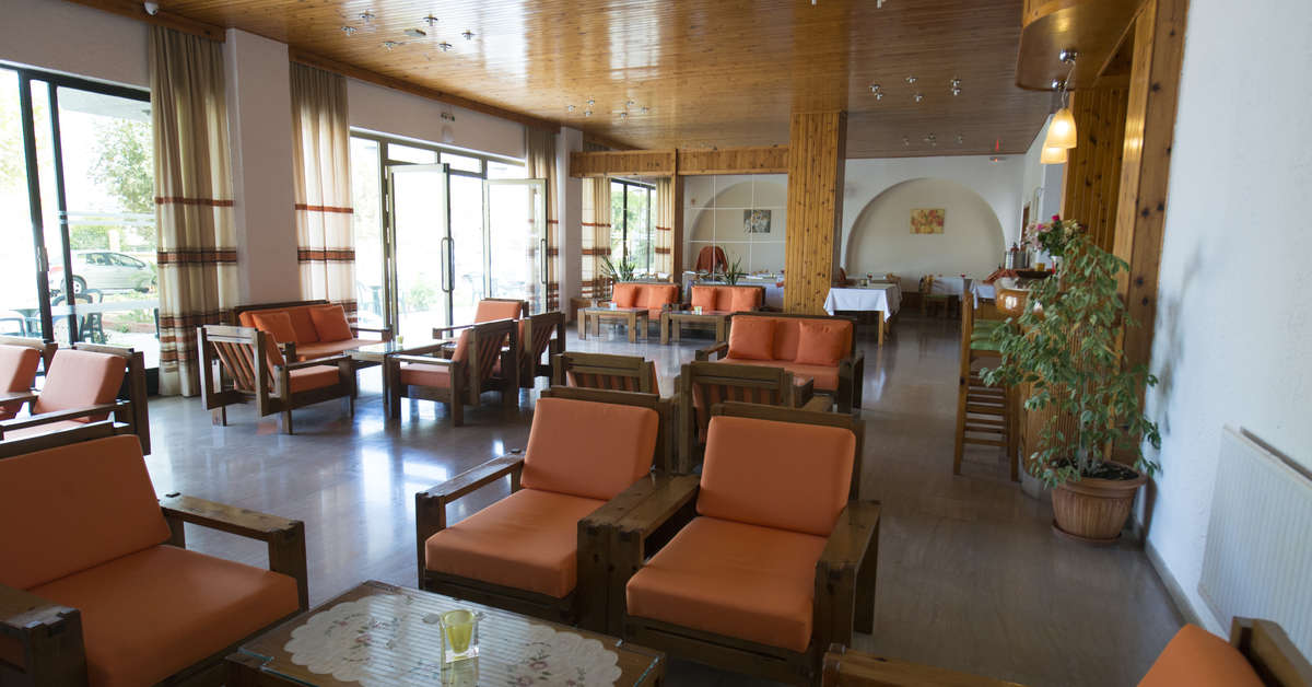 Een foto van het interieur van International Hotel