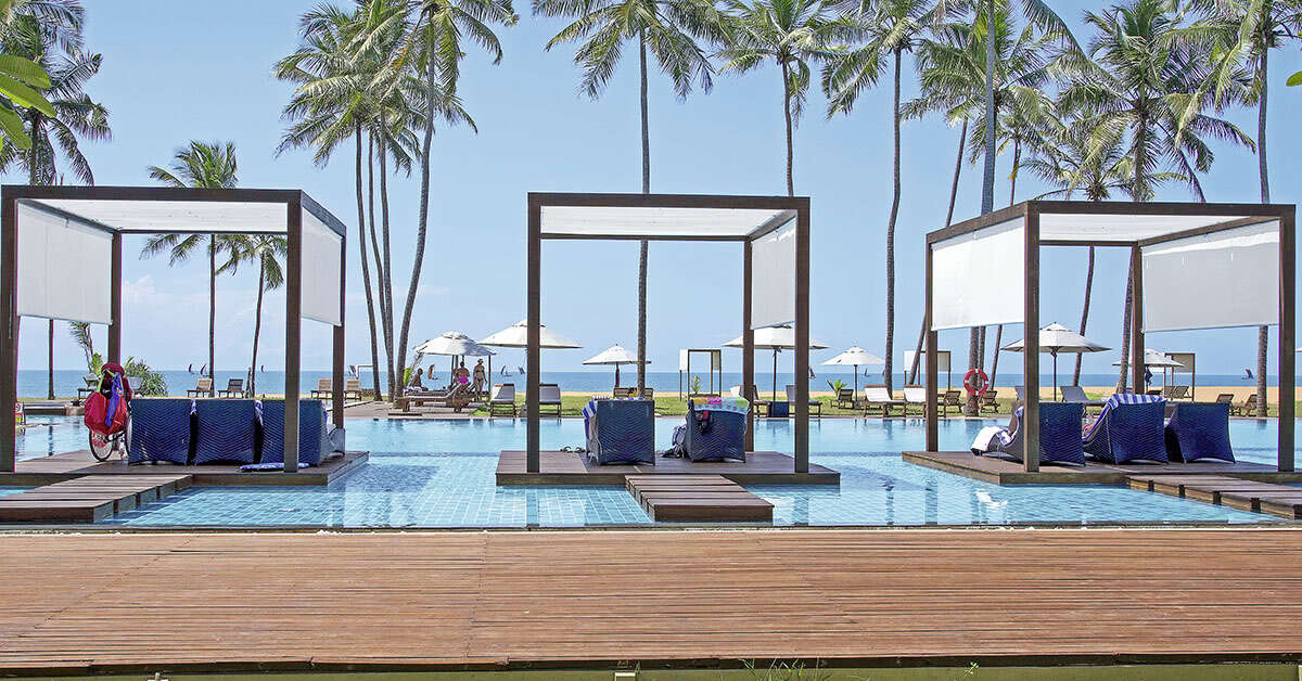 Een foto van het zwembad bij Suriya Luxury Resort
