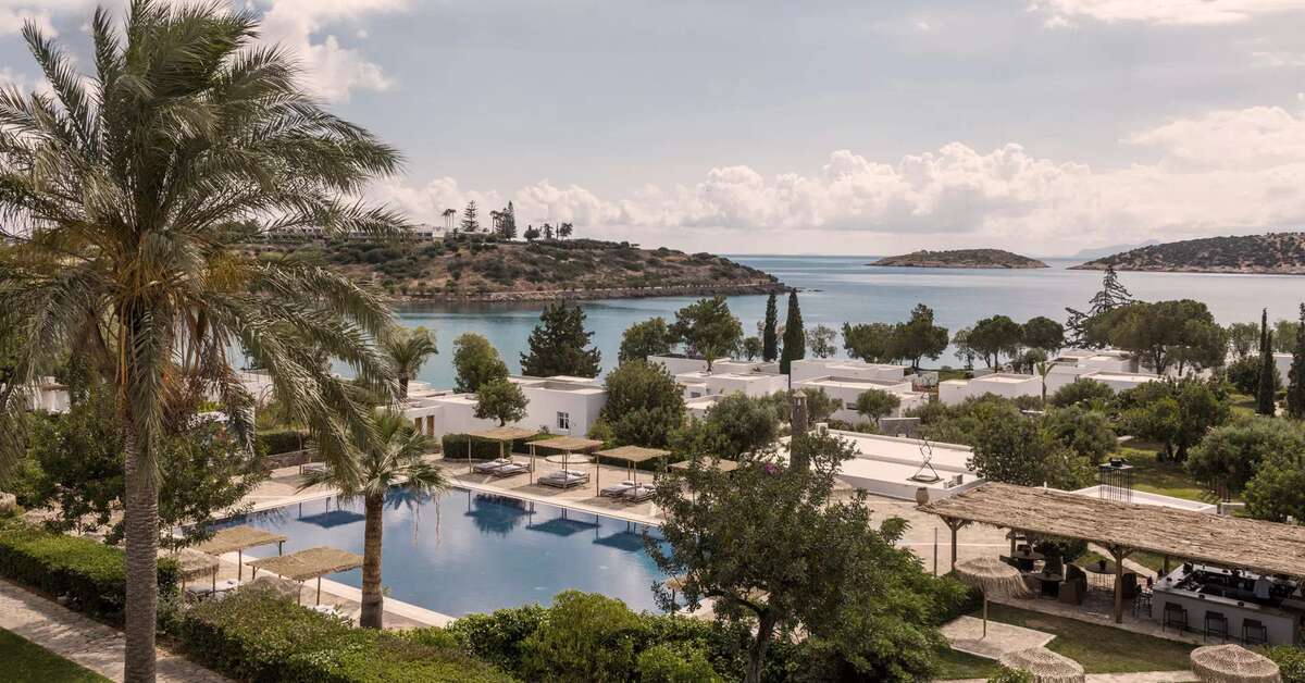 Een foto van het zwembad bij Minos Beach Art Hotel