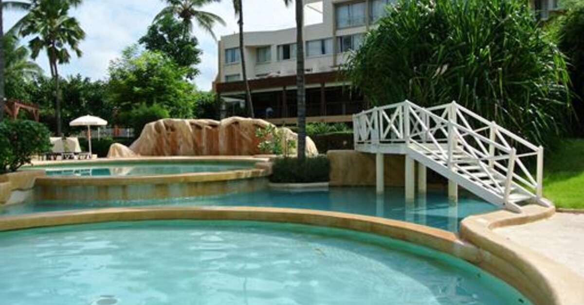 Een foto van het zwembad bij Hotel Palm Beach