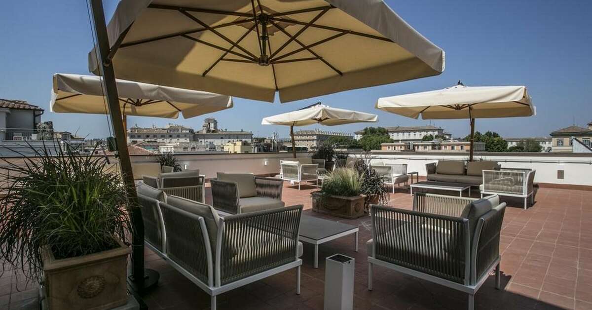 Een foto van het terras bij Rome Glam Hotel