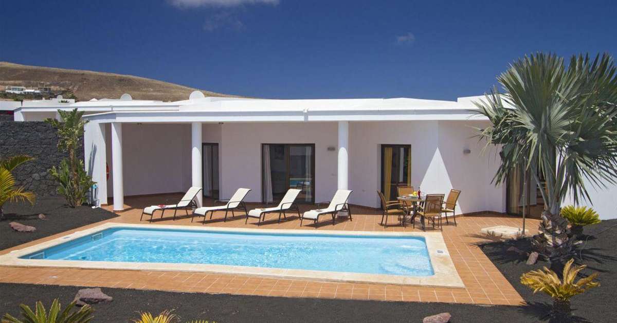 Een foto van het zwembad bij Villas Blancas