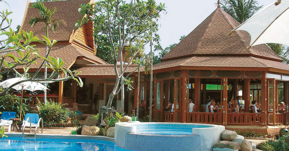 Een foto van het zwembad bij Thai House Beach Resort