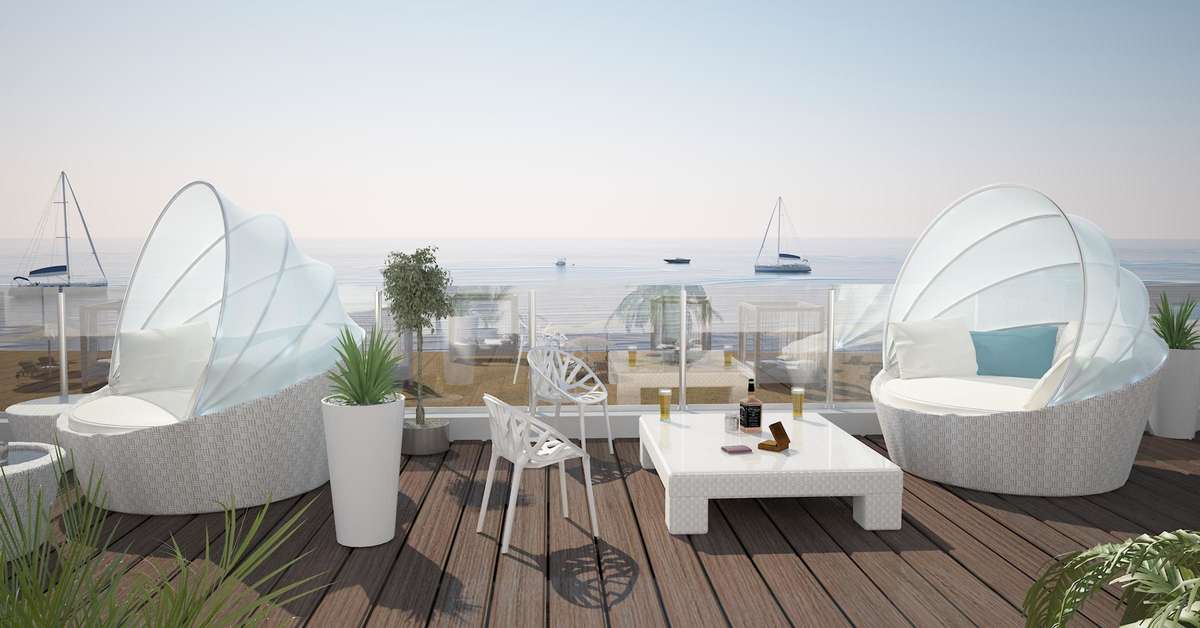 Een foto van het terras bij The King Evelthon Beach Hotel & Resort