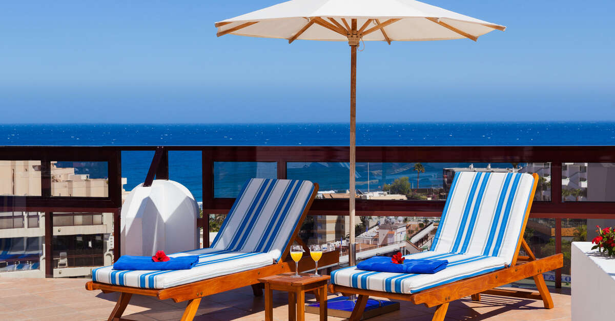 Ein Foto von der Terrasse im Seaside Sandy Beach