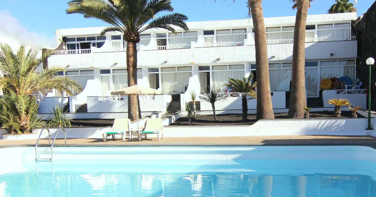 Een foto van het zwembad bij Arena Dorada Appartementen