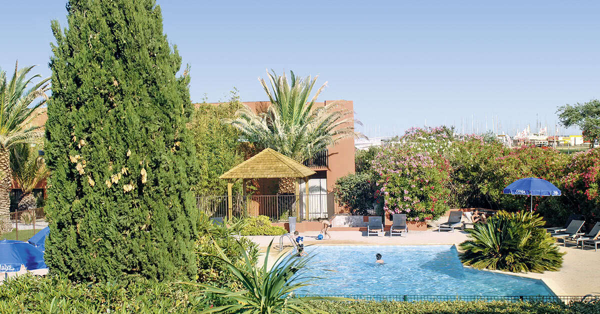 Een foto van het zwembad bij Odalys Residence du Golfe