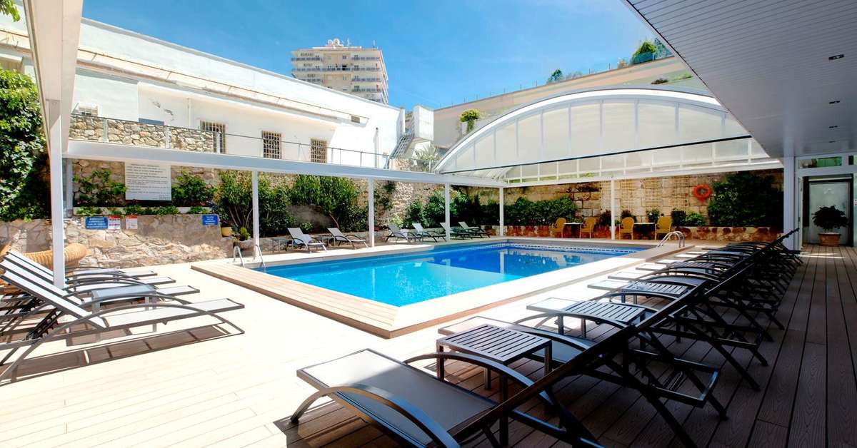 Een foto van het zwembad bij Agua Beach Hotel