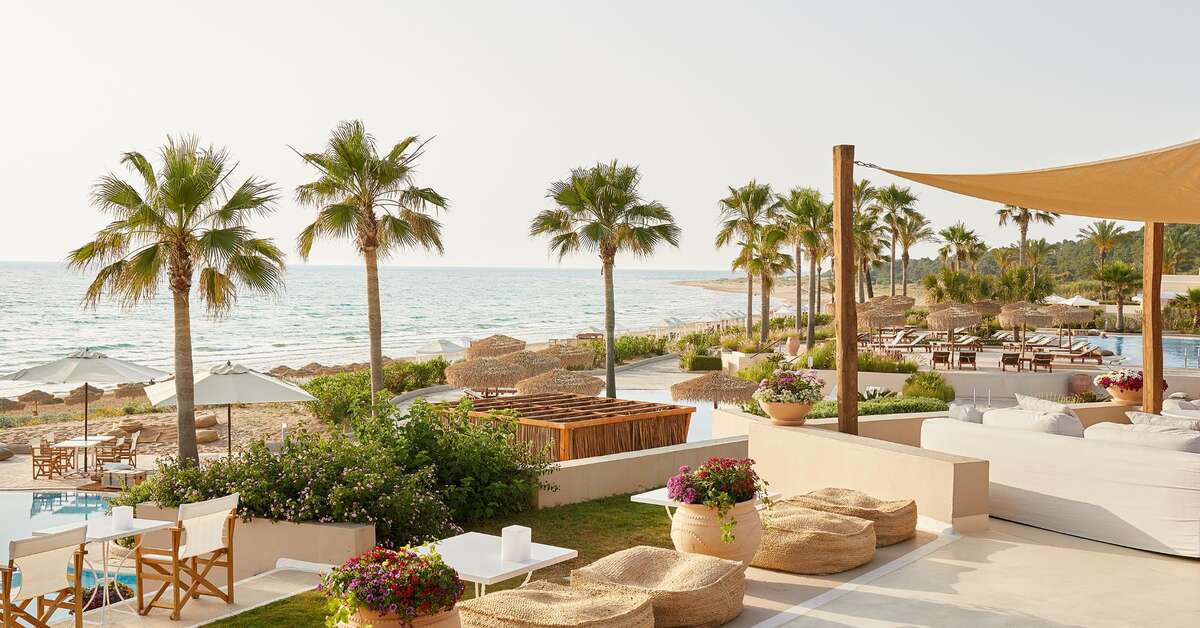 Een foto van het zwembad bij Grecotel La Riviera & Aqua Park