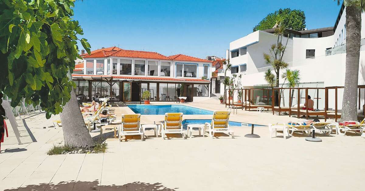 Een foto van het zwembad bij Miramar Hotel & Spa