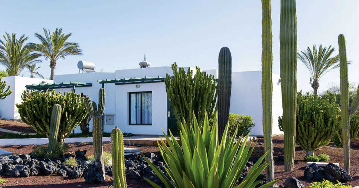 Een foto van de buitenkant van Club Playa Blanca Hotel