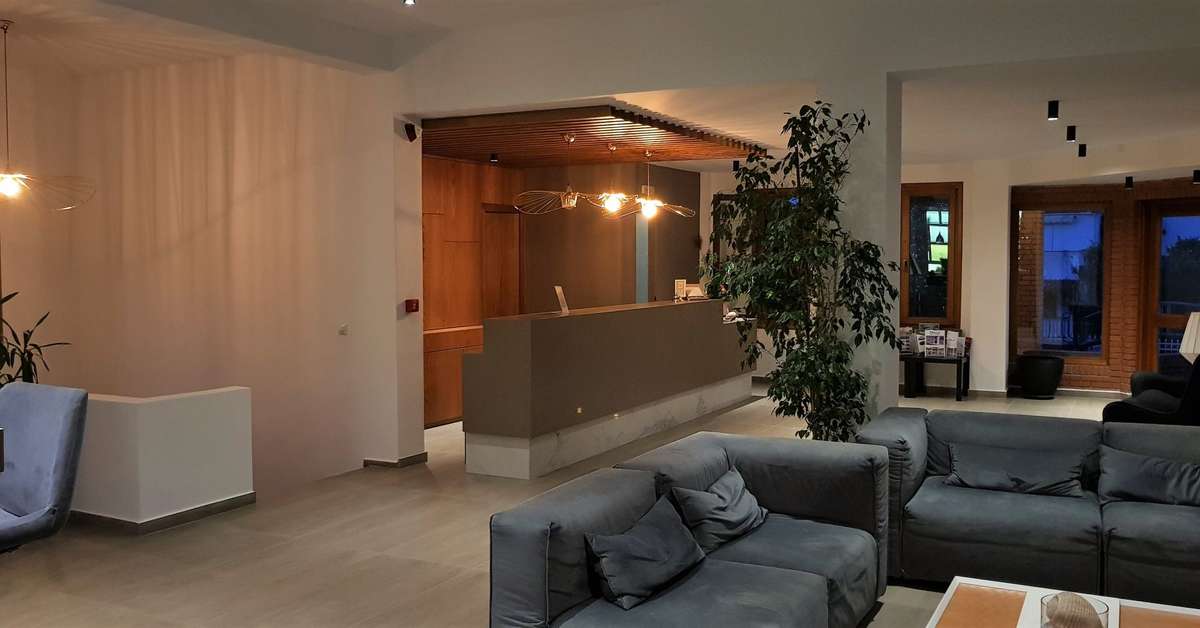 Een foto van het interieur van Palladium Hotel