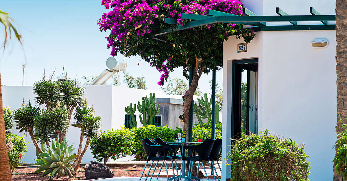 Een foto van de buitenkant van Club Playa Blanca Hotel