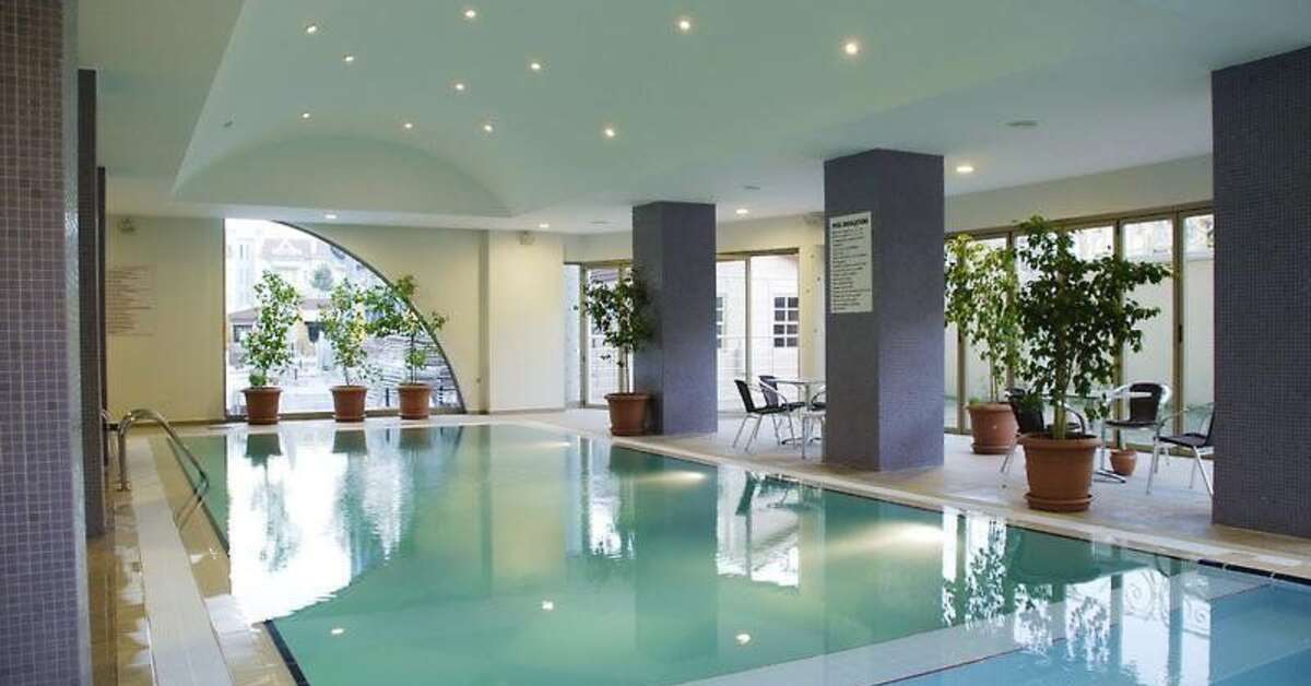 Een foto van het zwembad bij Grand Pasa Hotel