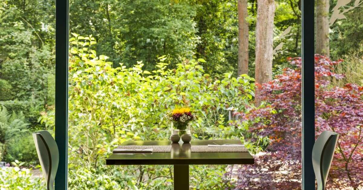 Een foto van het terras bij Fletcher Hotel Restaurant Sparrenhorst Veluwe