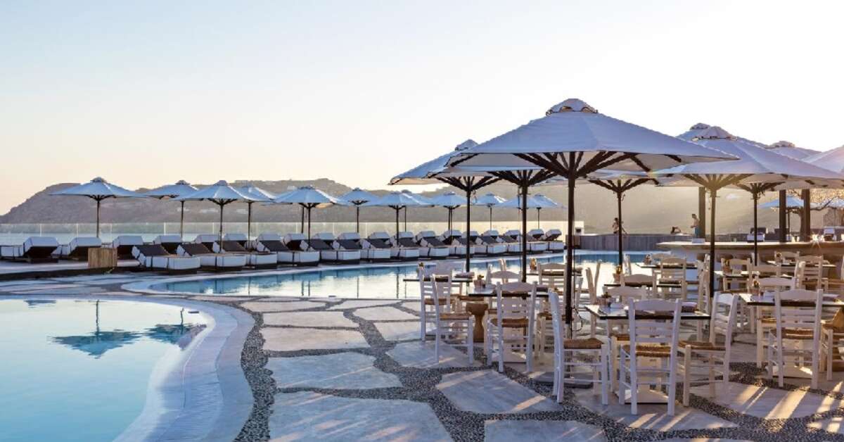 Een foto van het terras bij Myconian Imperial Resort