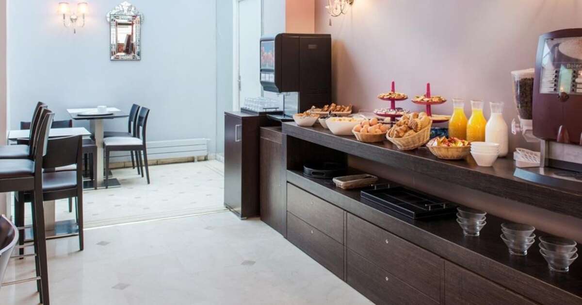 Een foto van het interieur van Hotel Corona Rodier