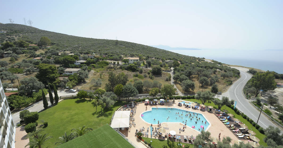 Een foto van het zwembad bij Evia Riviera Resort