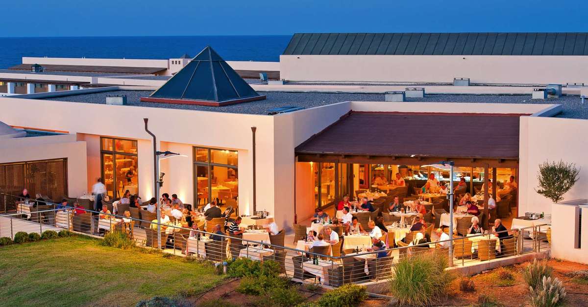 Een foto van het terras bij Giannoulis Cavo Spada Luxury Sports & Leisure Resort & Spa