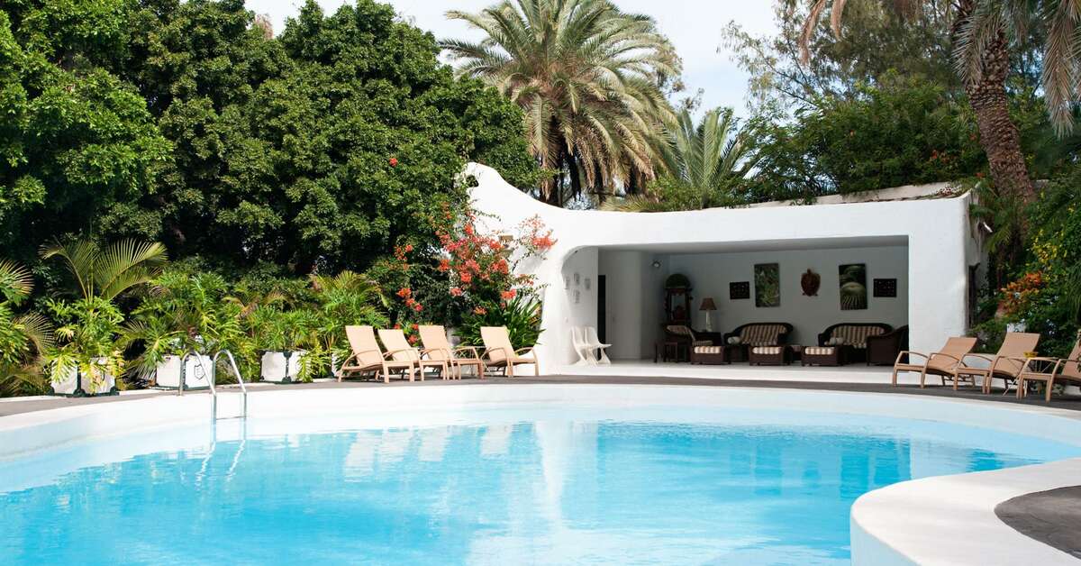Een foto van het zwembad bij Hotel Rural Cortijo San Ignacio Golf