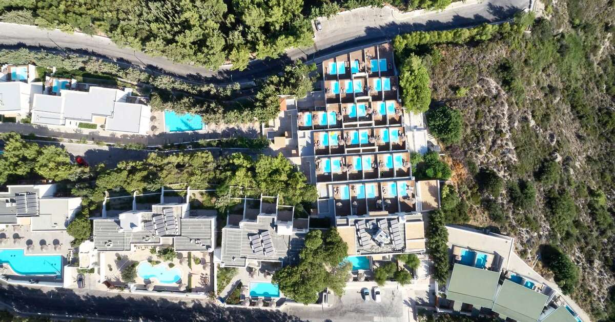 Ein Foto vom Pool im Esperos Village Blue & Spa