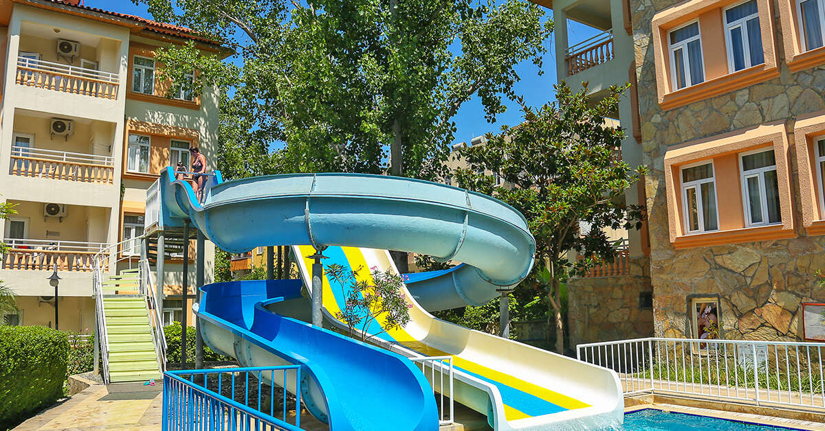 Een foto van het zwembad bij Side Village Family Suite Hotel
