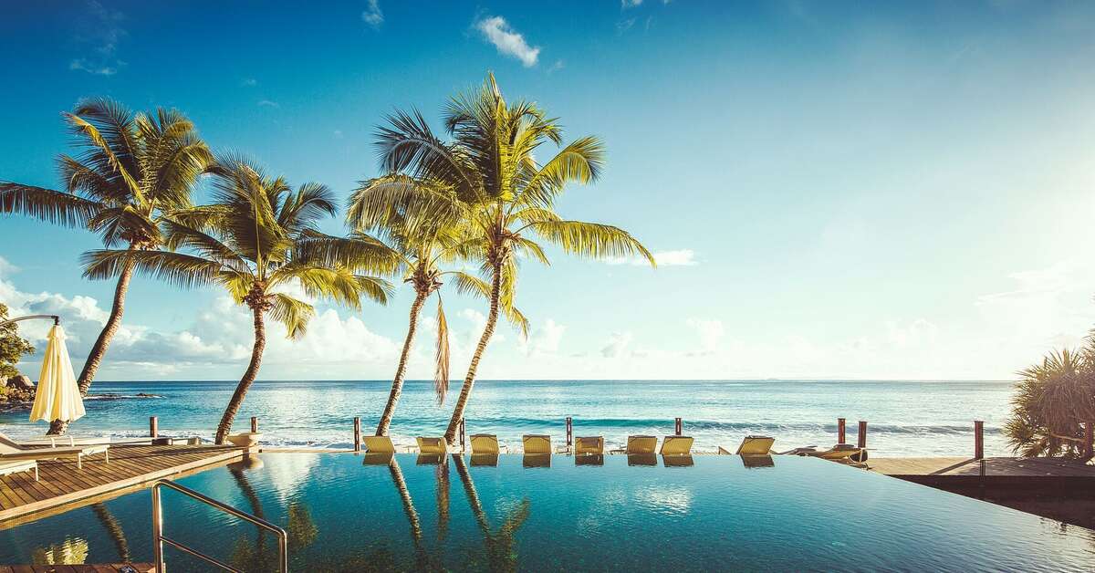 Een foto van het zwembad bij Carana Beach Hotel
