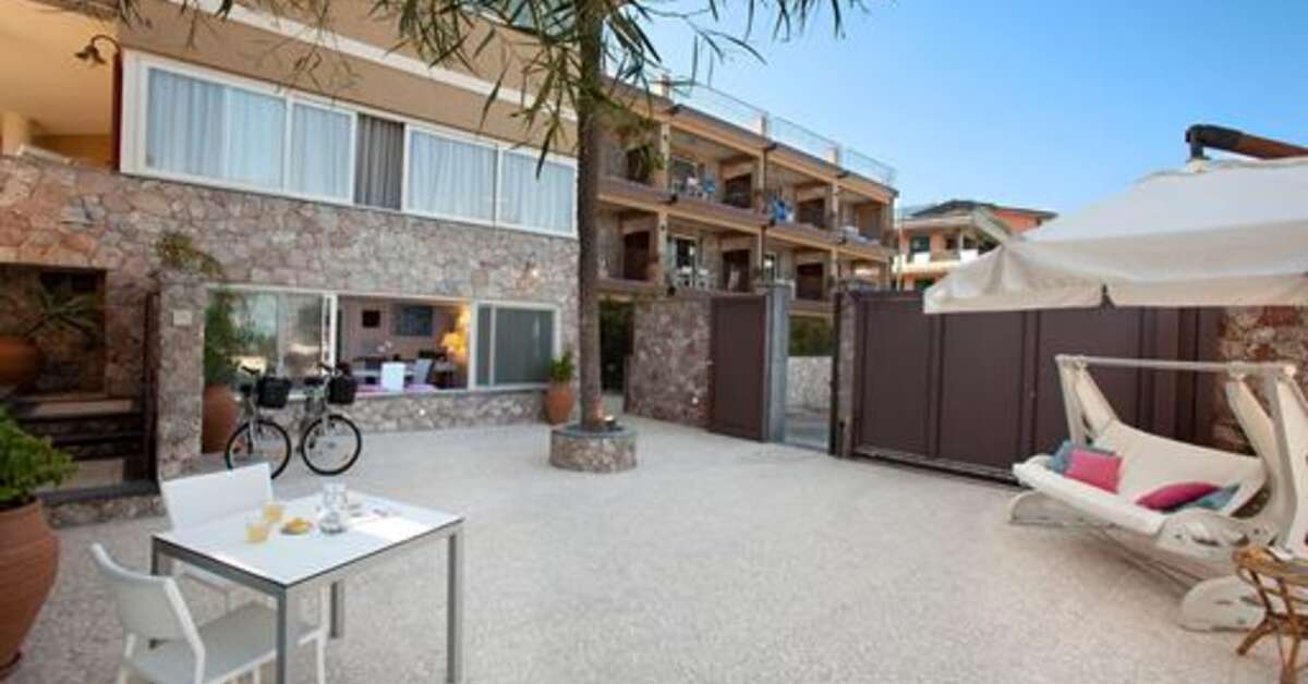 Een foto van het terras bij Villa Oasis Residence