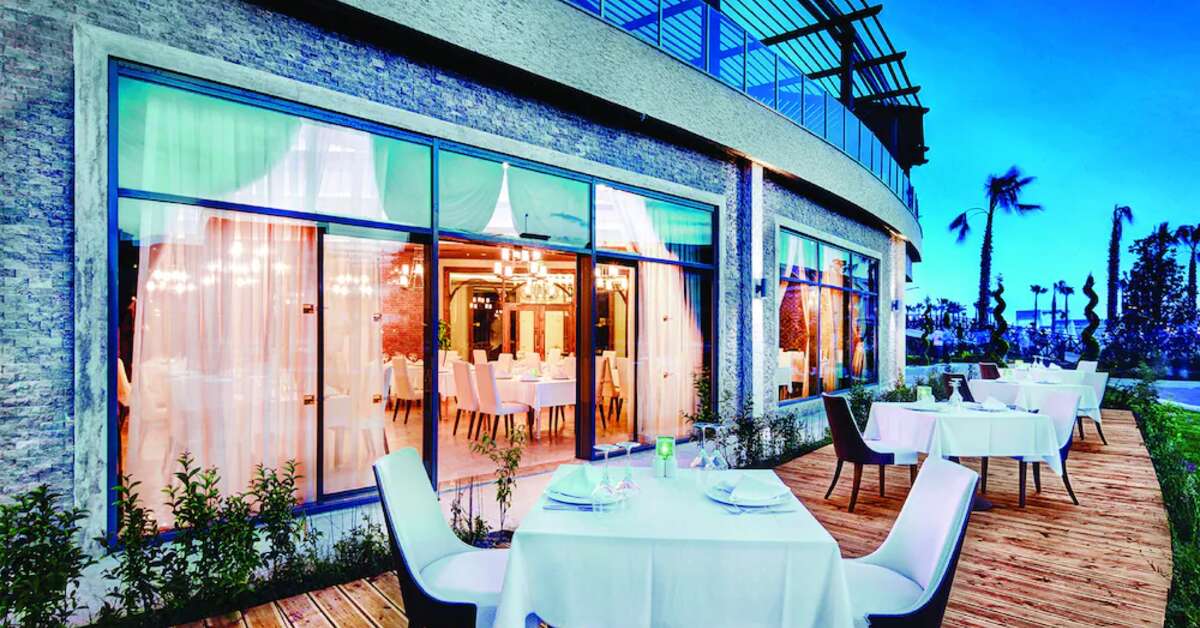 Een foto van het terras bij Magic Life Jacaranda