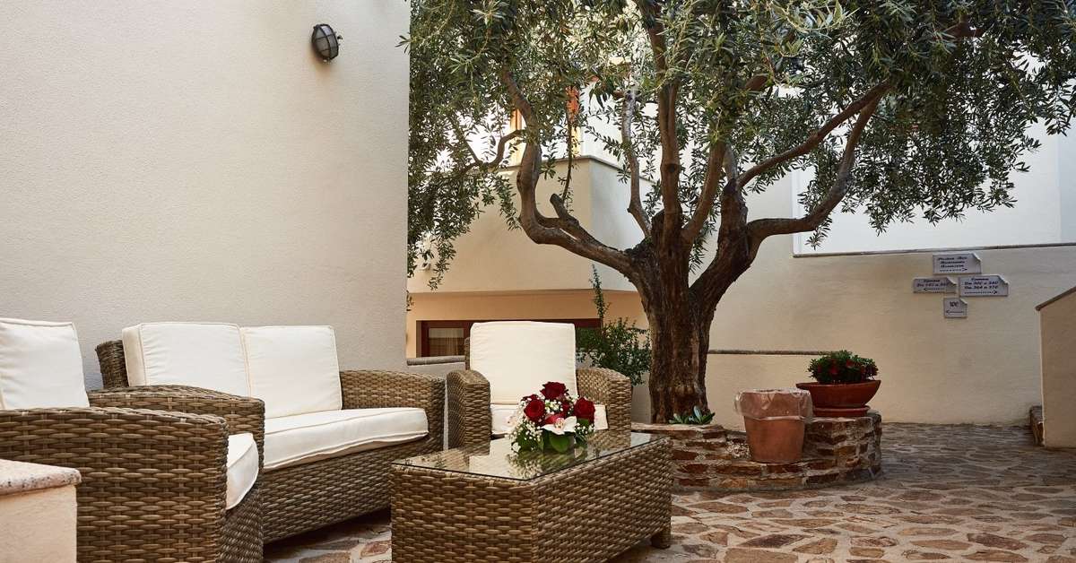 Een foto van het terras bij Parco Blu Club Resort