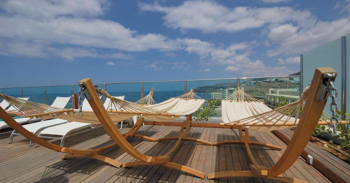 Een foto van het terras bij Bull Hotel Dorado Beach